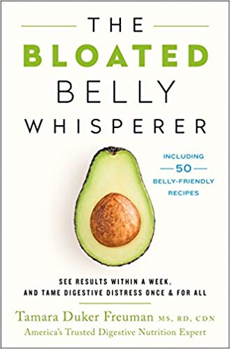 Front cover of "The Bloated Belly Whisperer" with image of a sliced in half avocado in the center