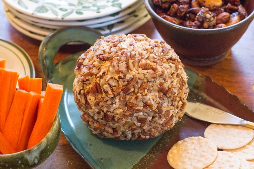 Blue Cheese & Cheddar Cheese Ball on a platter with rice crackers