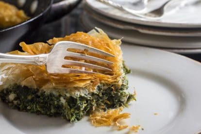 low FODMAP Spanakopita Spinach Pie closeup on white plate