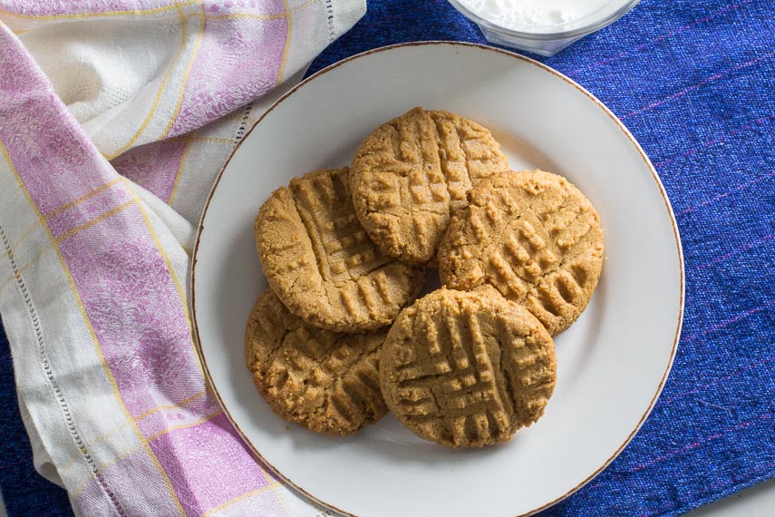 overhead image of one-bowl peanut butter cookies on white plate