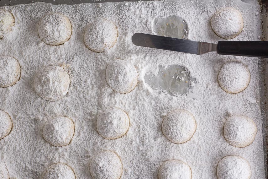 overhead image of pecan butterballs on baking pan