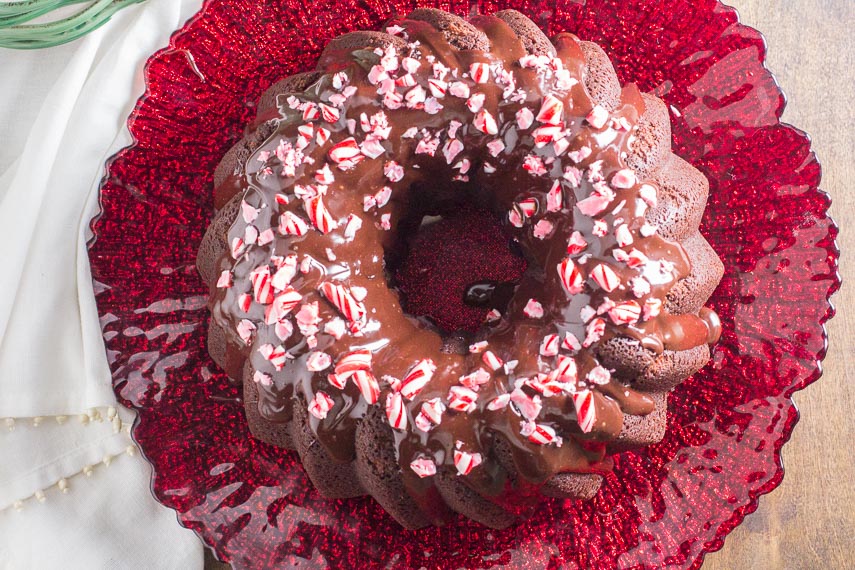 overhead image of low FODMAP Chocolate Peppermint Cake on a red plate
