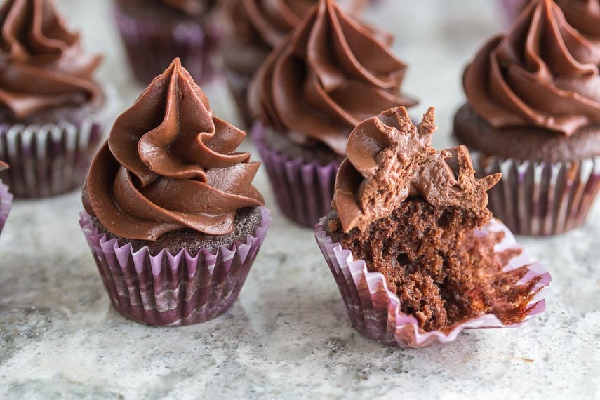 bite out of low FODMAP mini chocolate ganache cupcakes