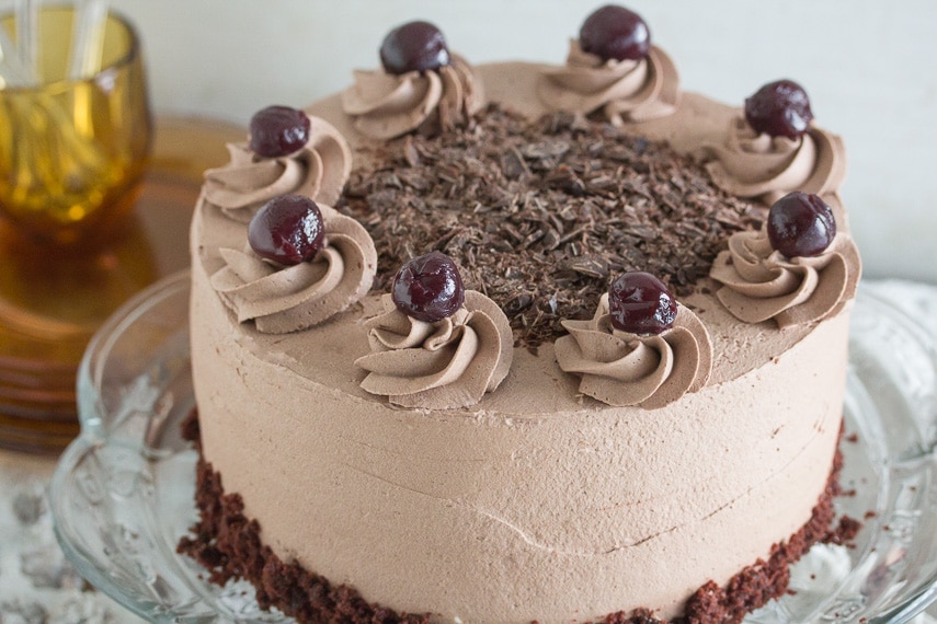top view of low FODMAP black forest cake on clear glass pedestal