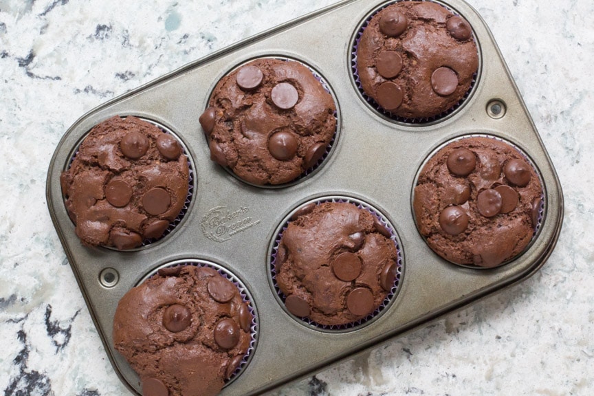 low FODMAP Double Chocolate Muffins in pan on quartz surface