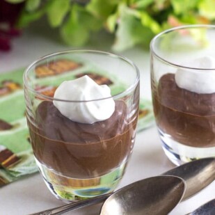 closeup of Low FODMAP Irish Whiskey Chocolate Mousse in small glass cups with silver spoons