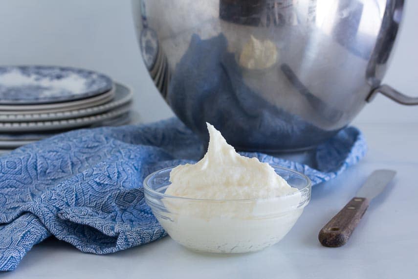 low FODMAP cream cheese frosting in a bowl and glass dish