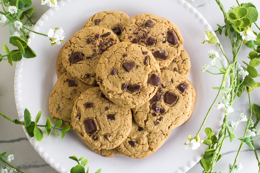 Low FODMAP Chewy Peanut Butter Chocolate Chunk Cookies on white plate; overhead image