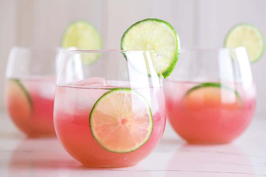closeup of low FODMAP Blueberry Limeade in clear glasses 2