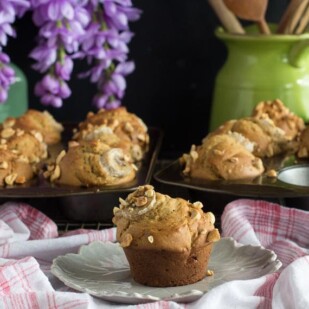 horizontal image of low FODMAP Peanut Butter Banana Muffins; on plate and in muffin pans