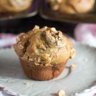 low FODMAP Peanut Butter Banana Muffins on a gray plate