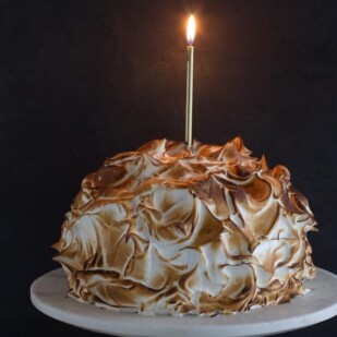 low FODMAP lemon meringue cake with candle