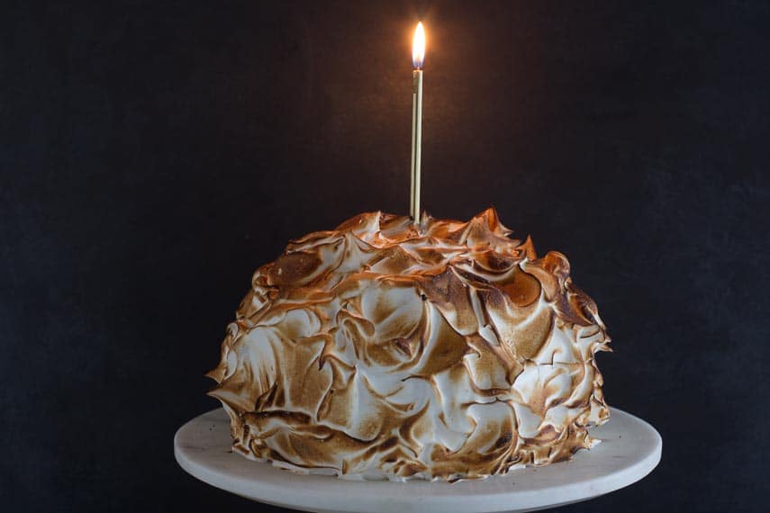 low FODMAP lemon meringue cake with candle