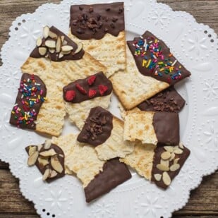 overhead low FODMAP Chocolate covered matzo on a white plate