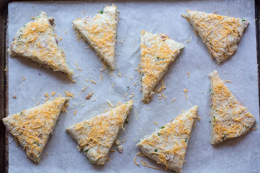 unbaked low FODMAP Ham & Cheese Scones on parchment lined baking pan