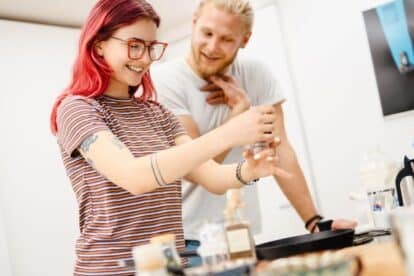 couple cooking in kitchen. vadymvdrobot via 123rf