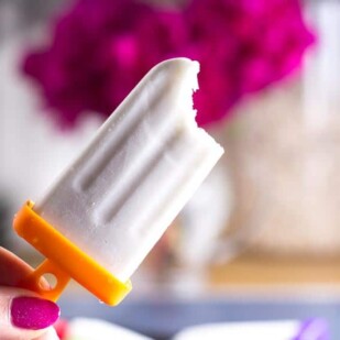 bite taken out of low FODMAP coconut popsicles