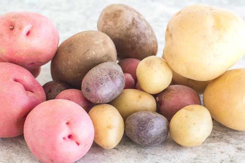 pile of potatoes on gray quartz surface