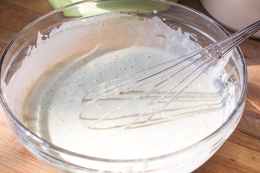 batter for Low FODMAP Sheetpan Pancakes in glass bowl with whisk