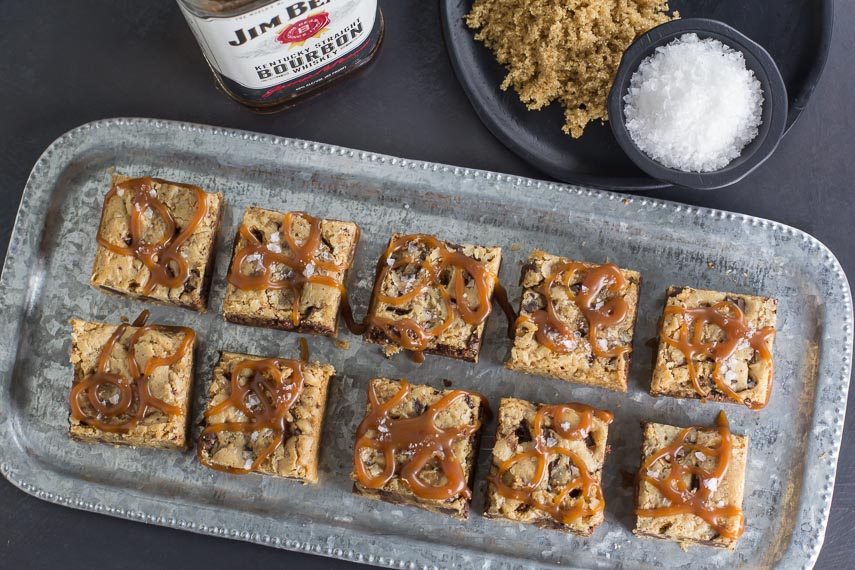overhead view of Low FODMAP Mocha Chocolate Chunk Bars with Whiskey Salted Caramel on a tin tray