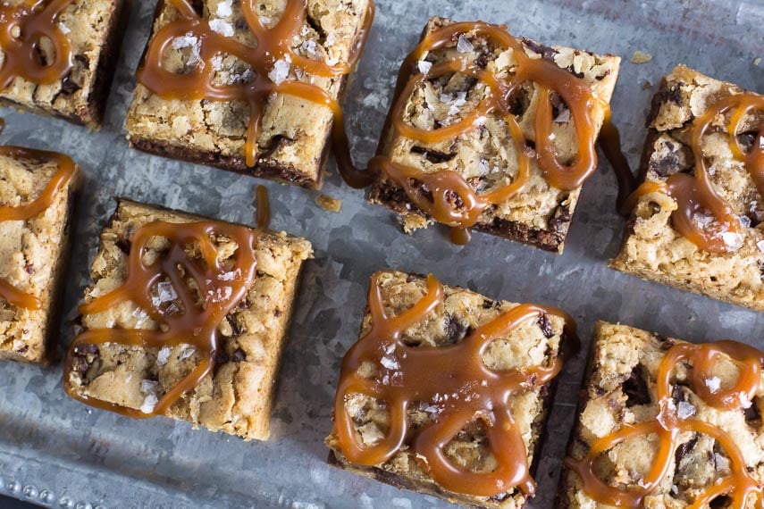 overhead view of Low FODMAP Mocha Chocolate Chunk Bars with Whiskey Salted Caramel on a tin tray