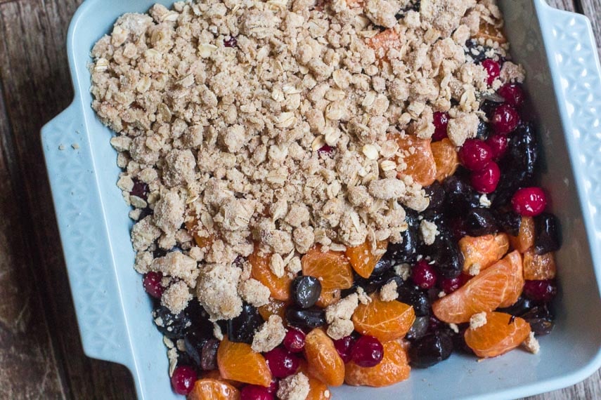 Topping fruit filling with oat crisp topping for Low FODMAP Cranberry Crisp with Grapes & Citrus