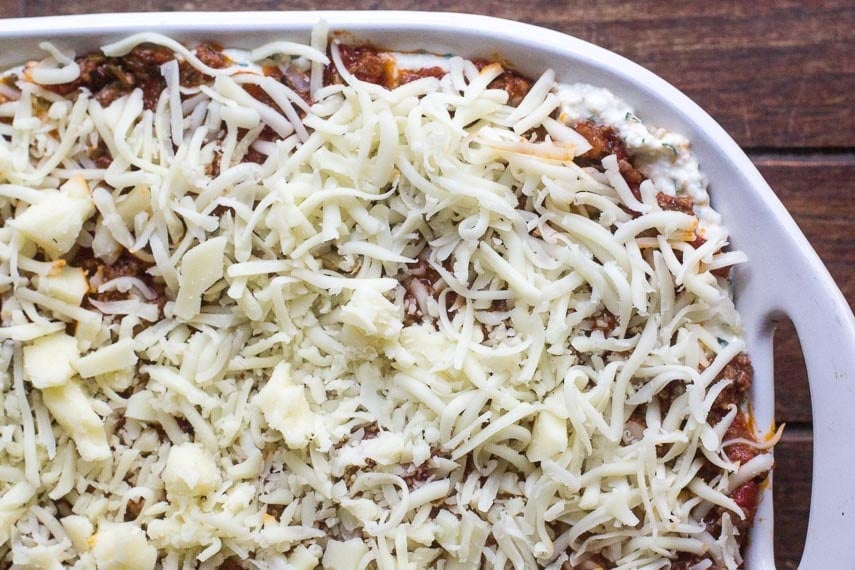 closeup of low FODMAP lasagna, with cottage cheese layer peeking through