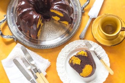 overhead image of low FODMAP Pumpkin Chocolate Marble Cake on yelllow background