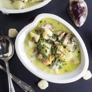 overhead view of low FODMAP clam chowder in a clam shaped dish