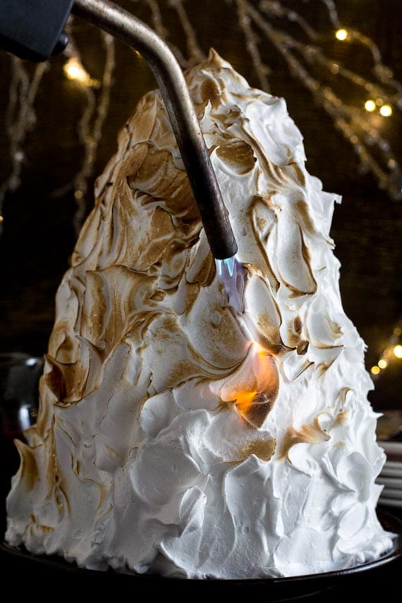 torching our Low FODMAP Baked Alaska with a propane torch