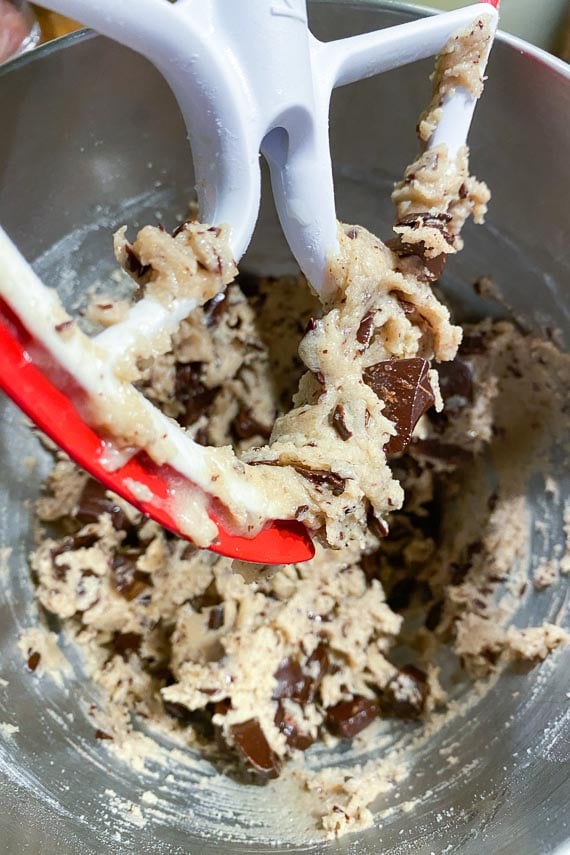 dough mixed together for low FODMAP chocolate chunk cookies in mixer bowl