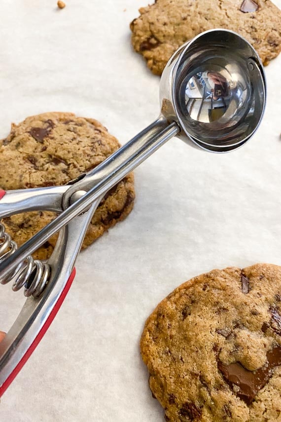 scoop used to form low FODMAP vegan chocolate chunk cookies