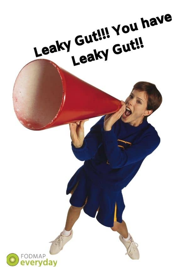 A woman in a cheerleading outfit with a megaphone with the text "Leaky Gut!! You Have Leaky Gut!" 