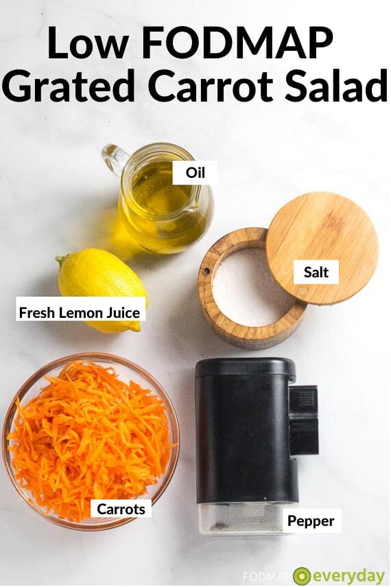 Ingredients for Low FODMAP Grated Carrot Salad on grey background