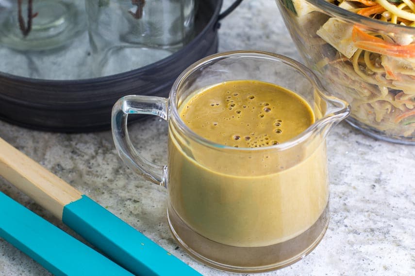 Low FODMAP Peanut Lime Sauce in a pitcher