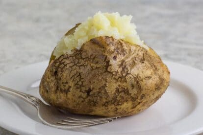No FODMAP baked potato closeup on white plate