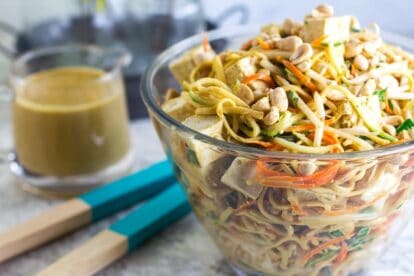 main image of Low FODMAP Zoodles, Noodles & Sprouts Salad in glass bowl