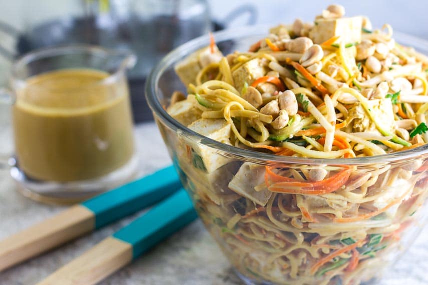 main image of Low FODMAP Zoodles, Noodles & Sprouts Salad in glass bowl