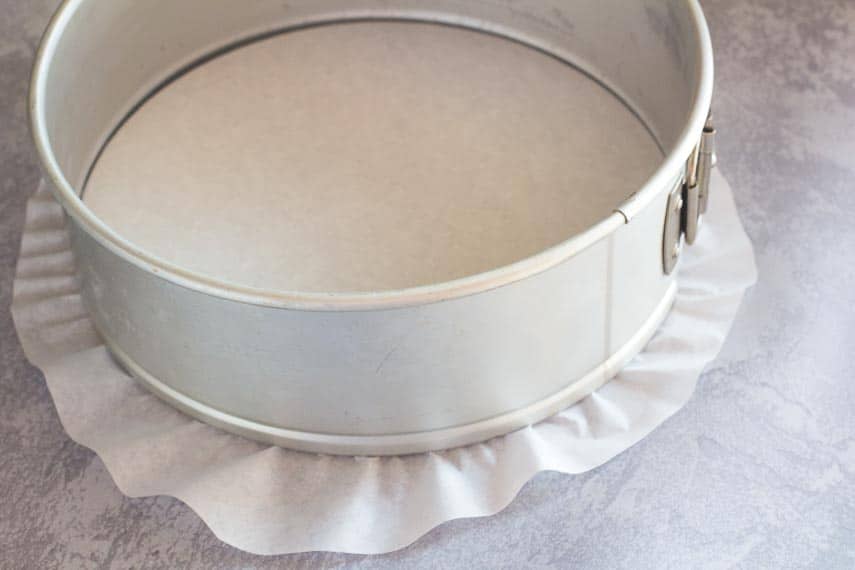 springform pan with parchment paper, snapped into place
