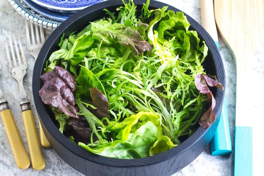 No FODMAP Leafy Green Salad in wooden bowl