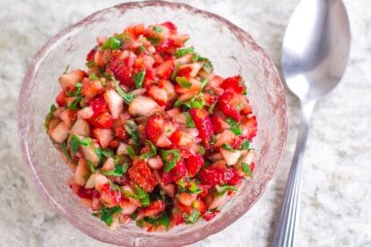 overhead strawberry salsa in glass dish.