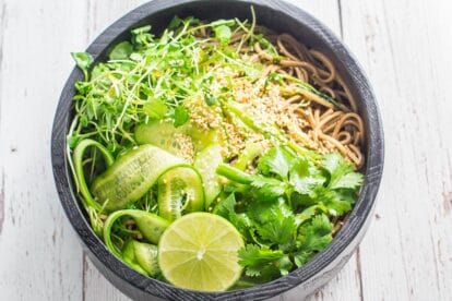 Cold soba noodle salad in ceramic bowl