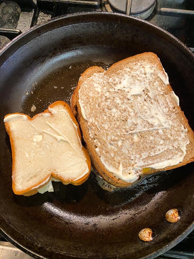 sandwiches in the pan, spread with mayo