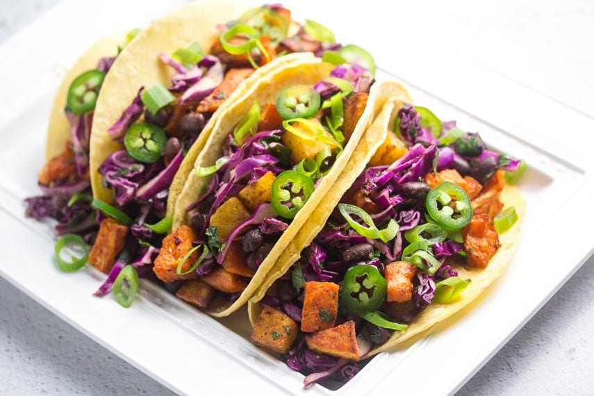 side overhead view of low FODMAP sweet potato tacos with black beans_