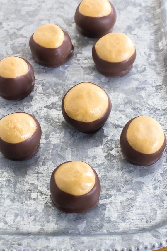 vertical image of Low FODMAP Buckeyes on aluminum tray