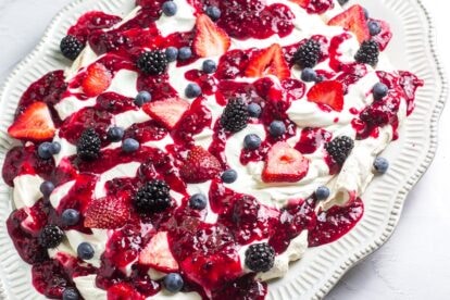 Main image of low FODMAP Mixed Berry Slab Pavlova on oval plate; white background