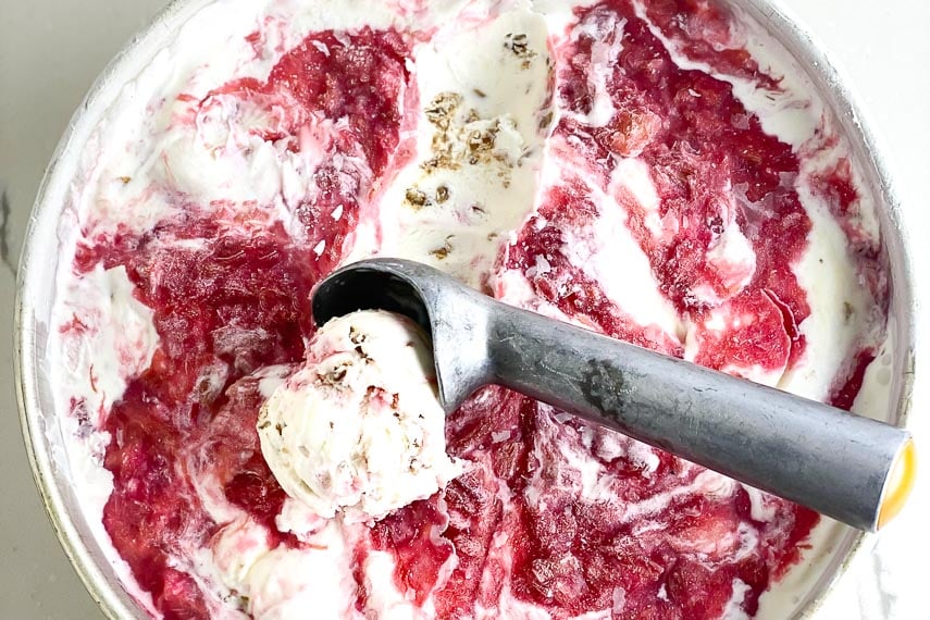 Overhead shot of rhubarb crumble ice cream in freezer container-2