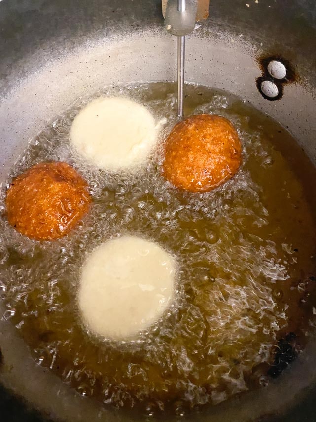 frying donuts; deep fry thermometer in oil