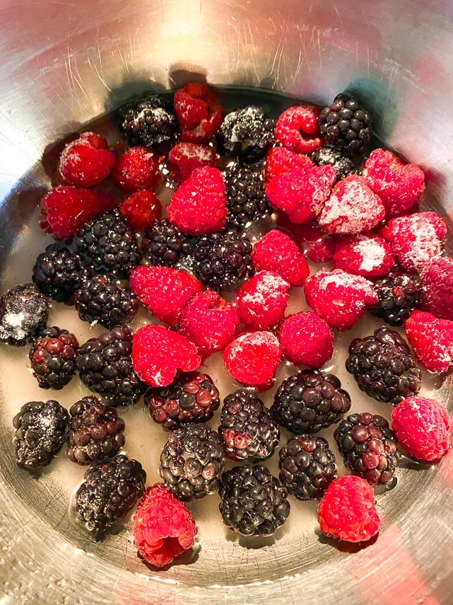 getting ready to make sauce for mixed berry pavlova
