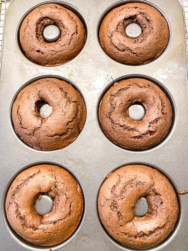 low FODMAP Baked chocolate doughnuts finsihed baking, in pan and cooling